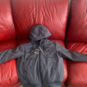 This is a brand, new hawk and company pro series gray insulated winter coat